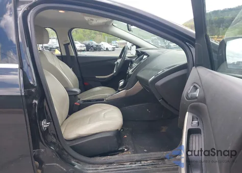 2015 Ford Focus Titanium from USA, damaged, VIN 1FADP3J28FL213712